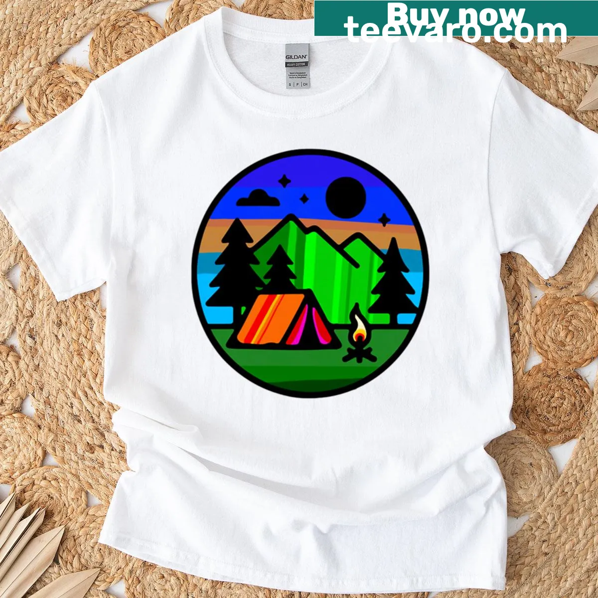 T-shirt depicting camping behind mountains with serene illustration — on a men's t-shirt