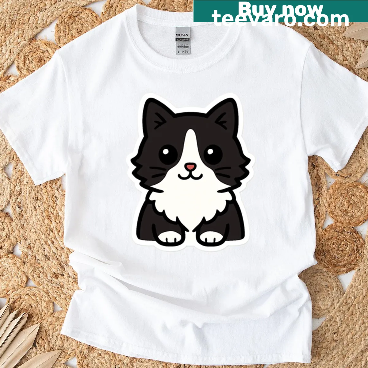Kawaii-style tuxedo cat graphic on a t-shirt — on a men's t-shirt
