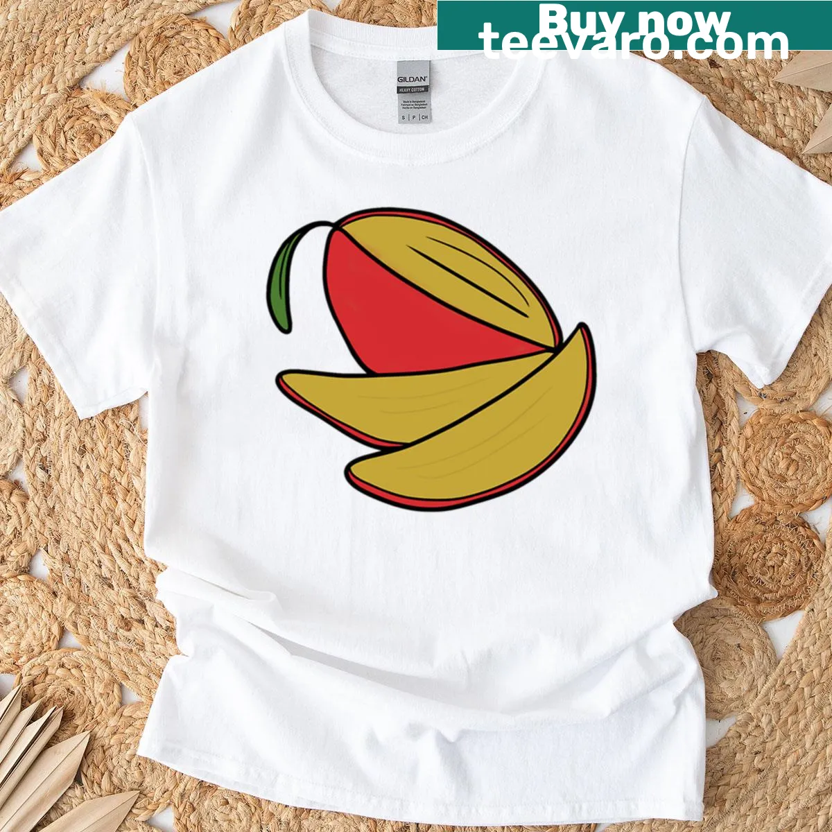 T-shirt featuring a graphic of a delicious mango fruit. — on a men's t-shirt