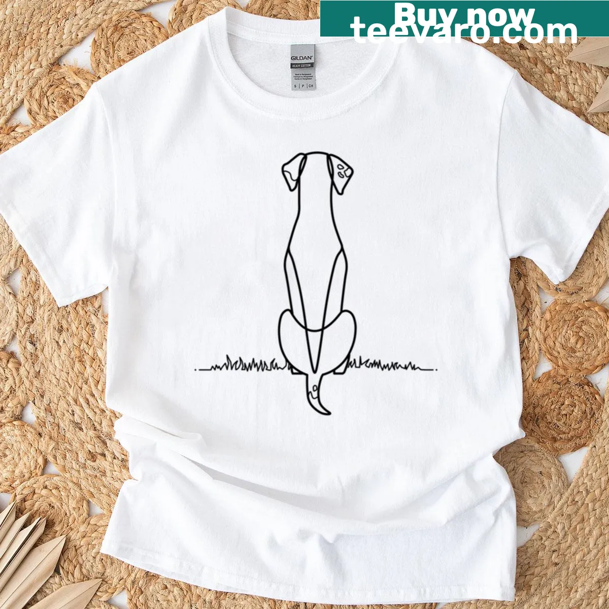 Illustration of a dog sitting on grass in a cute design — on a men's t-shirt