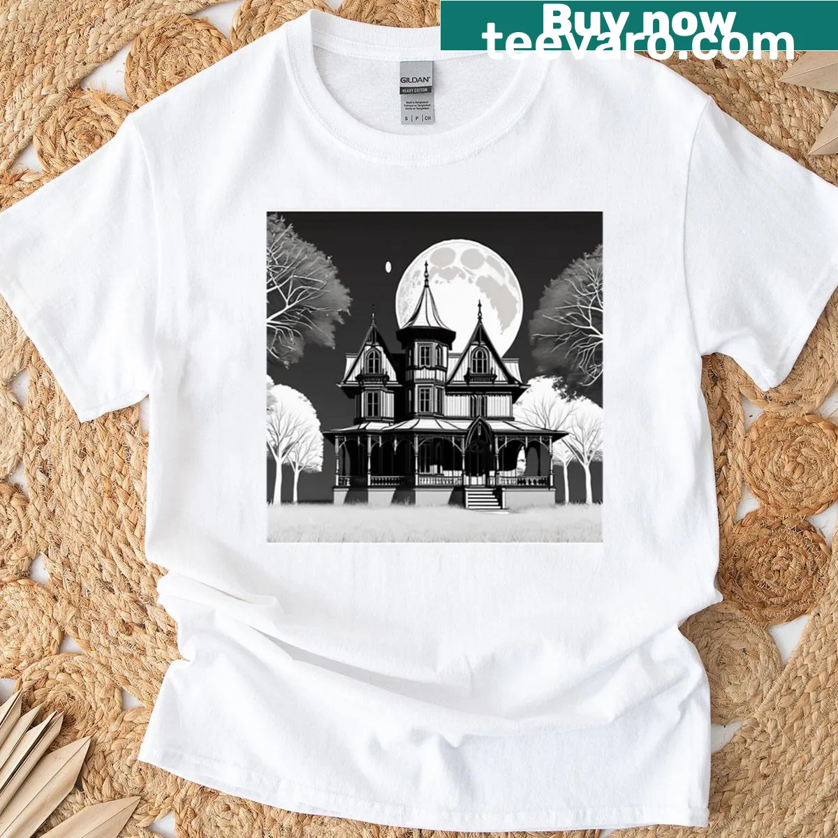 Graphic T-shirt featuring a gothic house under a full moon — on a men's t-shirt