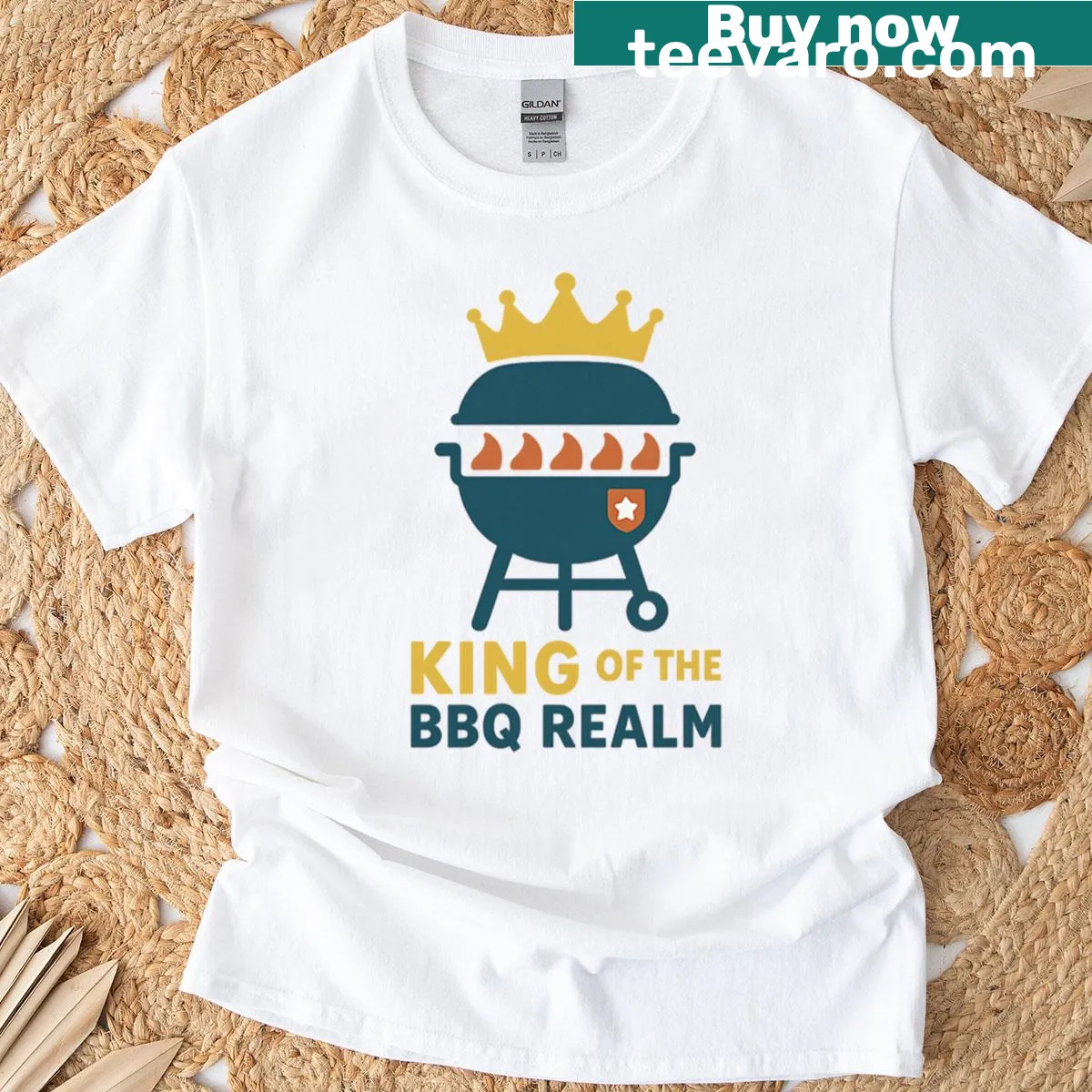 Oversized T-shirt declaring 'King Of The BBQ Realm' — on a men's t-shirt