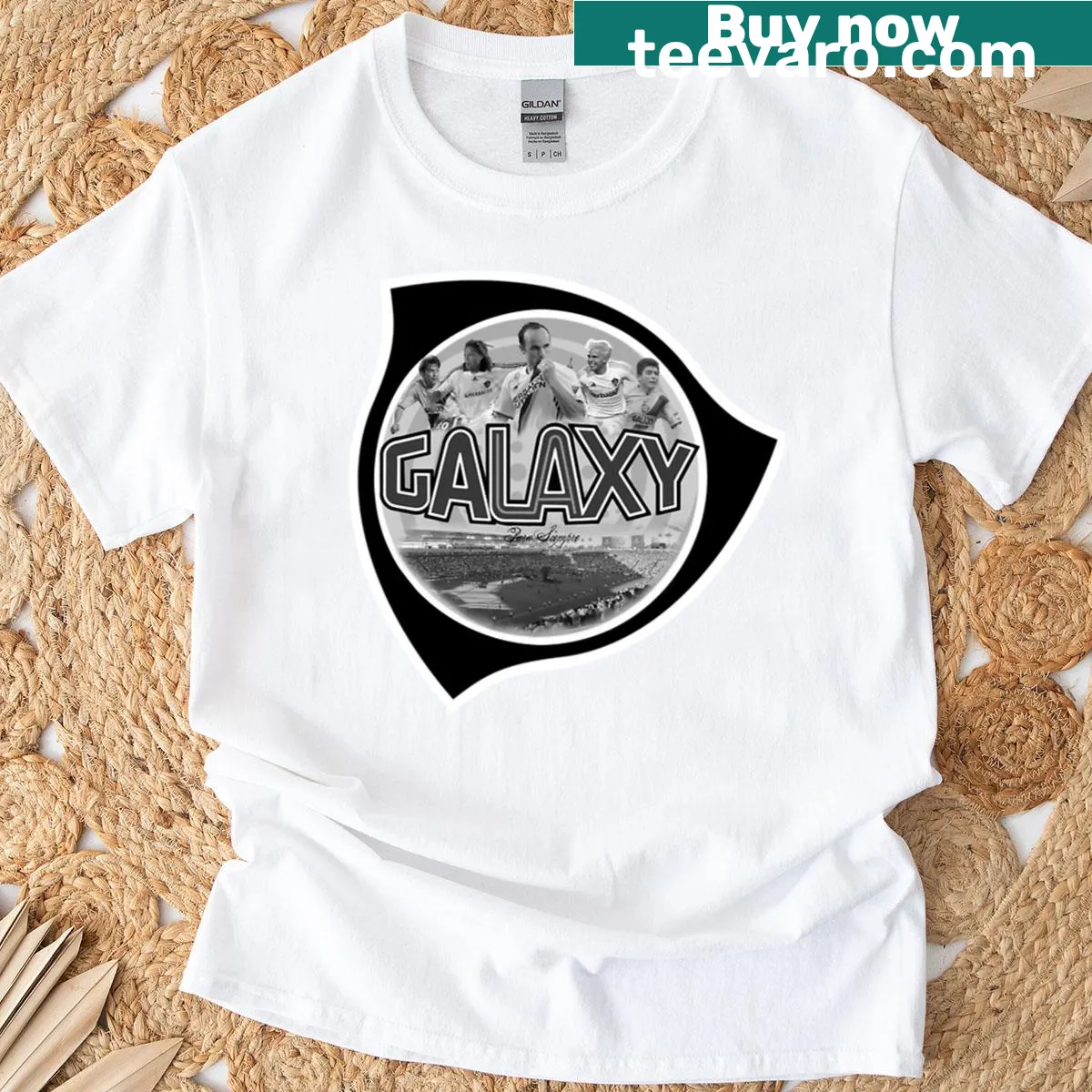 Illustrated galaxy design on a T-shirt featuring stars and planets — on a men's t-shirt