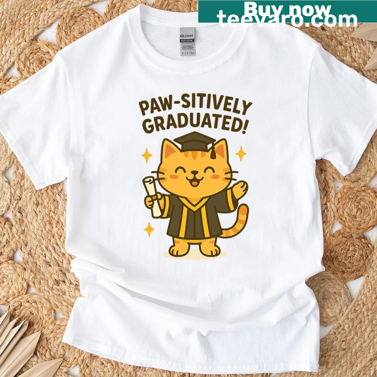 Playful typography saying 'Paw-sitively Graduated' on a t-shirt — on a men's t-shirt
