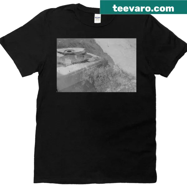 Graphic t-shirt featuring a wall through a reflective surface design