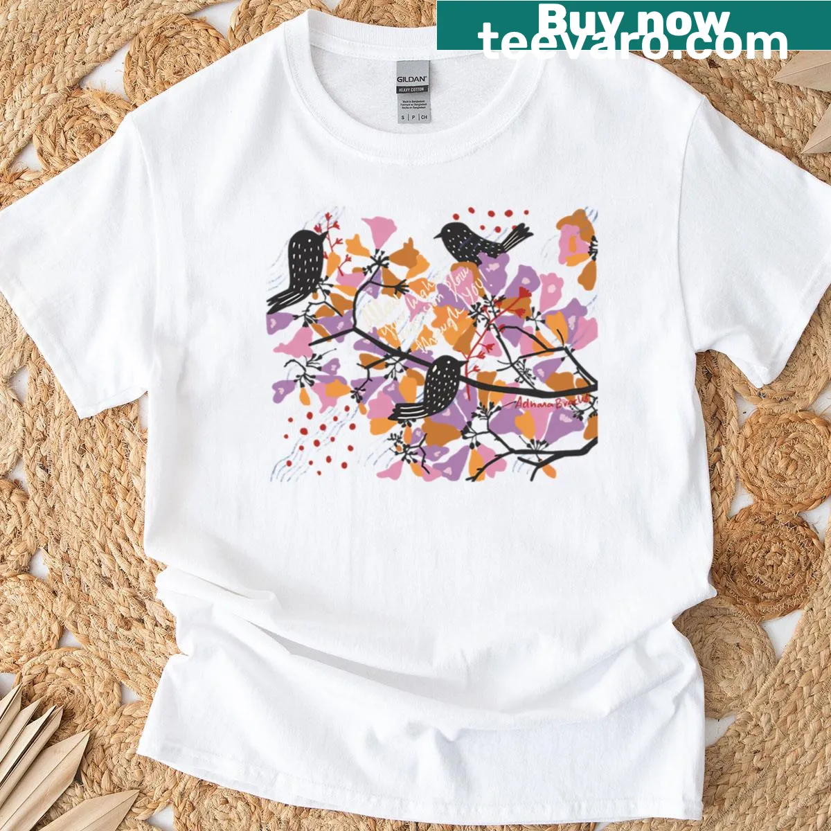 Oversized T-shirt with illustration of birds and colorful flowers — on a men's t-shirt