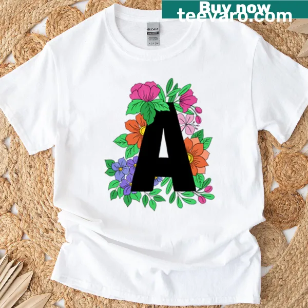 T-shirt featuring bold floral letter 'A' design