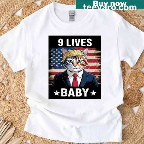 Cartoon cat with text '9 Lives' on a humorous T-shirt