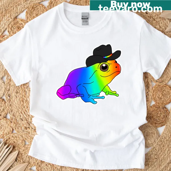 Playful t-shirt featuring a cowboy frog in front of a rainbow background.