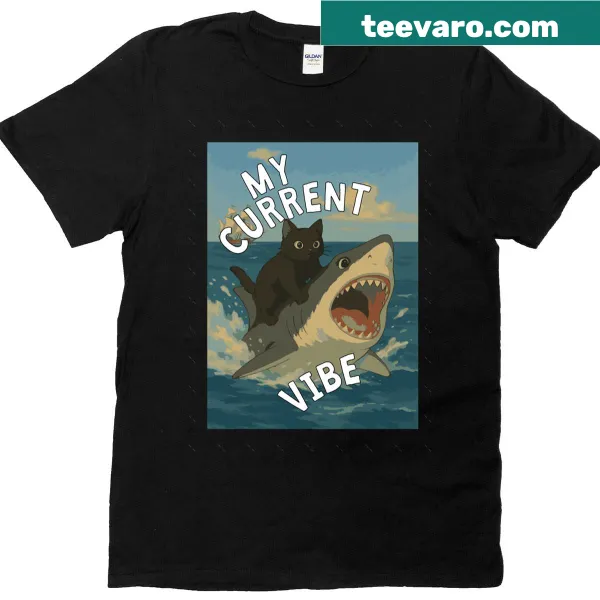 Oversized T-shirt featuring a cat riding a shark