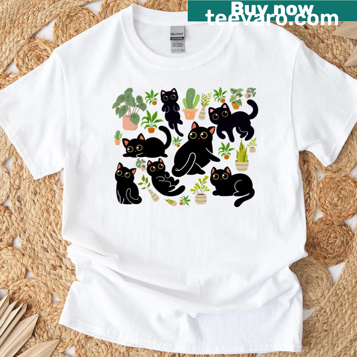 Patterned shirt with black cats and houseplants design — on a men's t-shirt