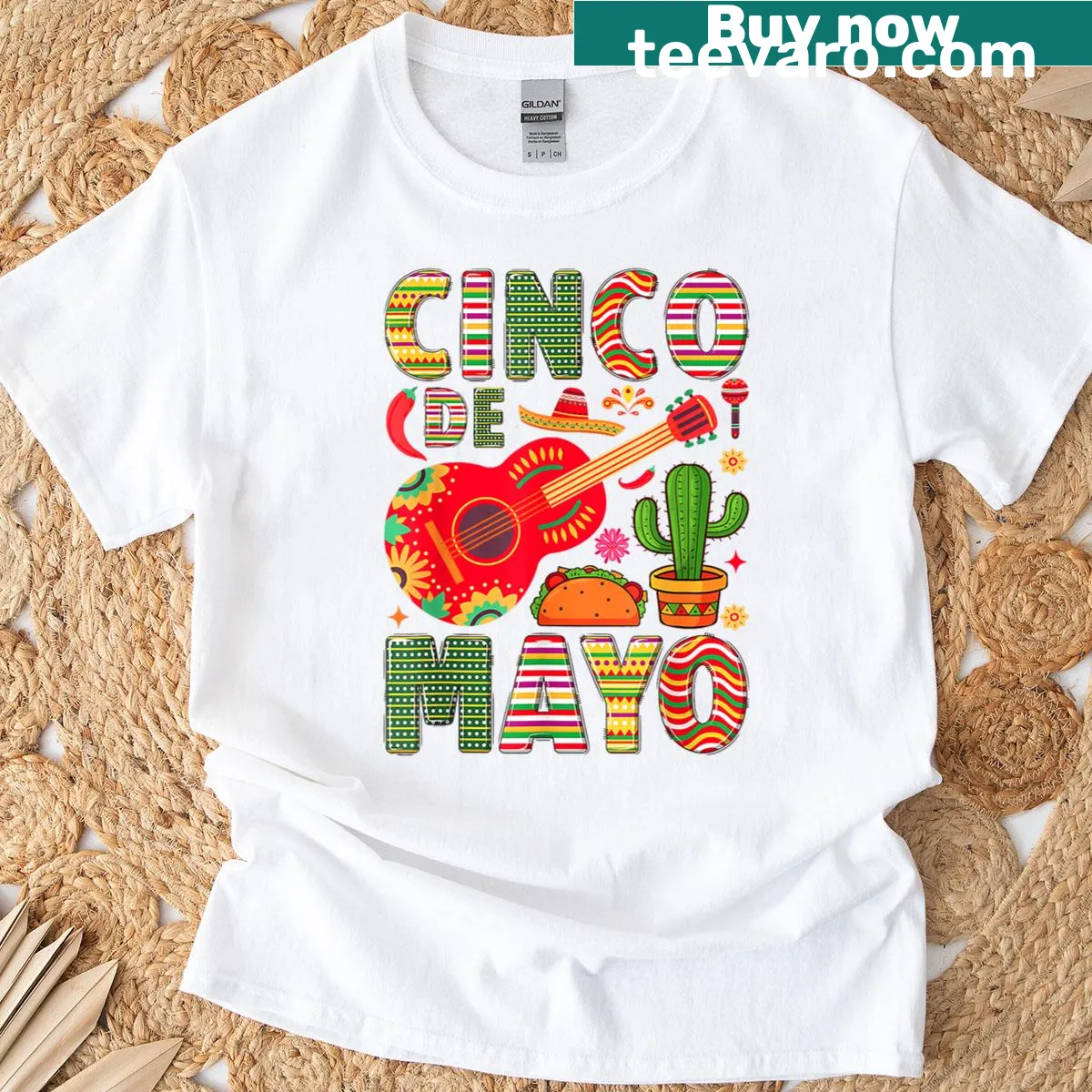 Fiesta-themed T-shirt celebrating Cinco de Mayo with fun illustrations. — on a men's t-shirt