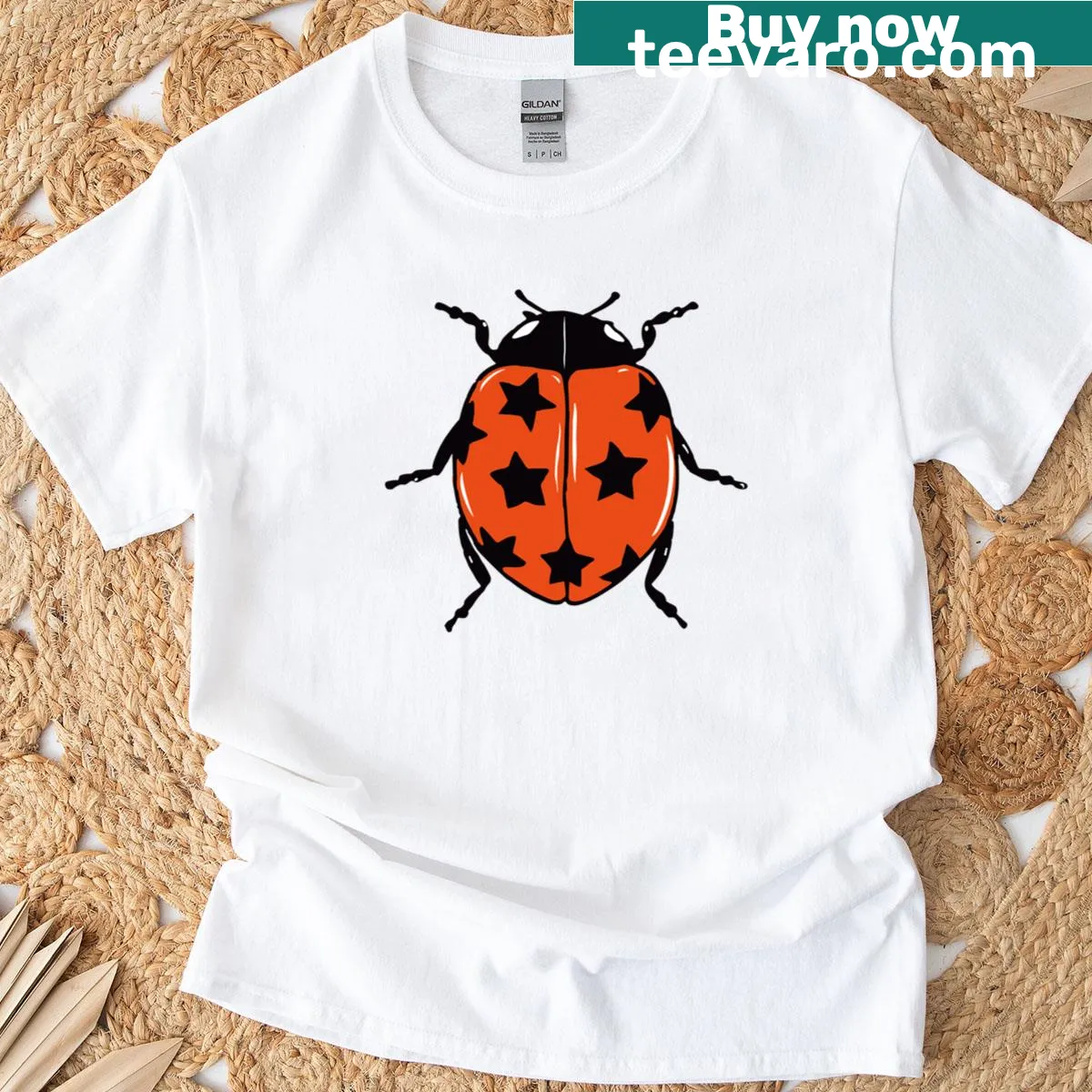 Cute T-shirt featuring a ladybug as a good luck charm — on a men's t-shirt