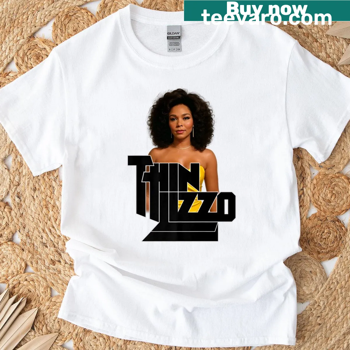 T-shirt featuring an artistic graphic of Thin Lizzy — on a men's t-shirt