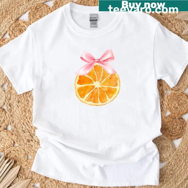 Illustration of an orange slice with a pink bow on a T-shirt