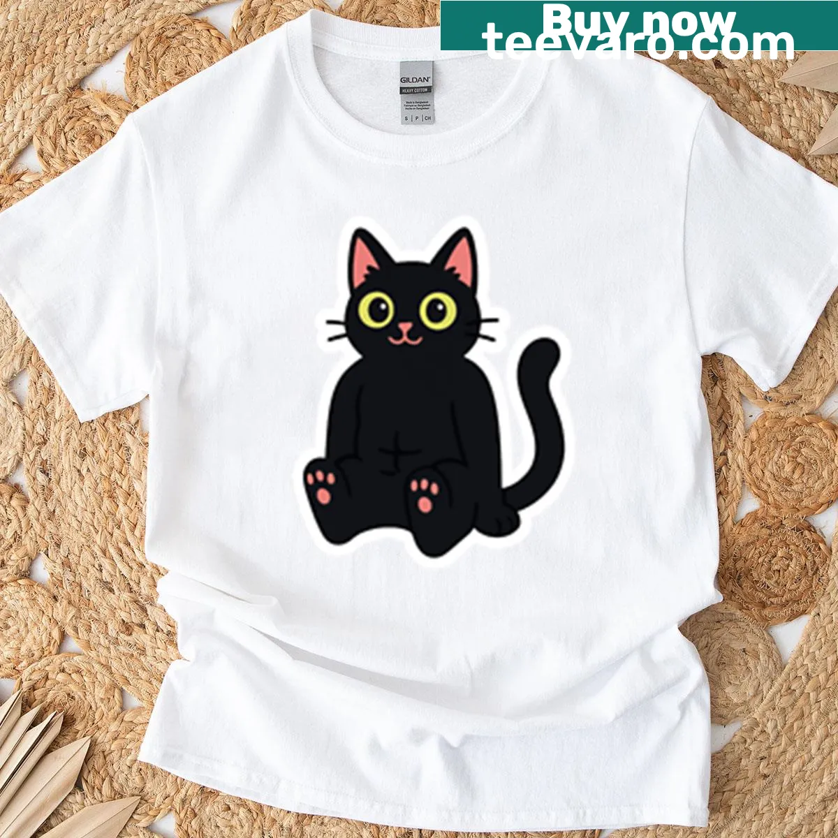 T-shirt with a wide-eyed black cat illustration in alert mode — on a men's t-shirt
