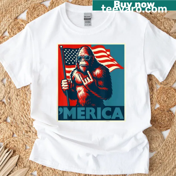 Patriotic T-shirt with Bigfoot and American flag graphics.