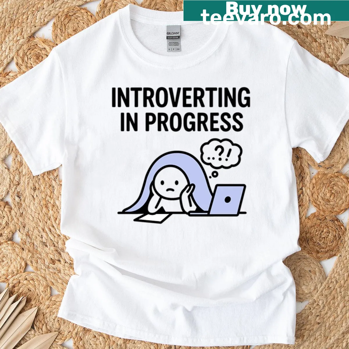 Oversized t-shirt with a cartoon character hiding under a blanket with a laptop — on a men's t-shirt