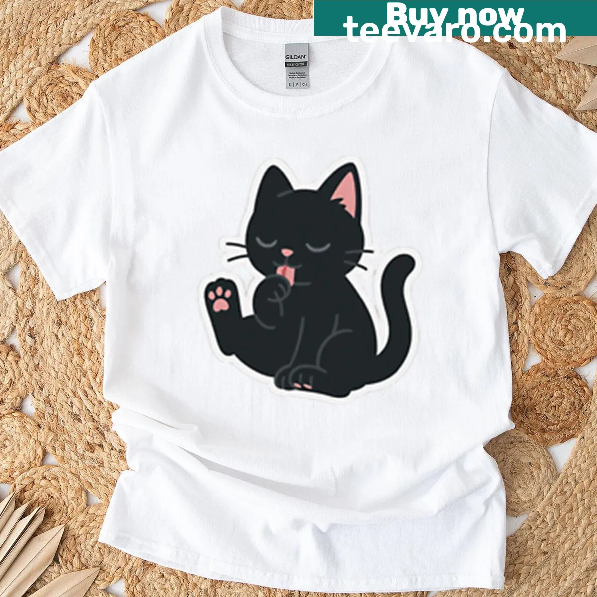 Black Cat grooming sticker t-shirt with playful illustration — on a men's t-shirt