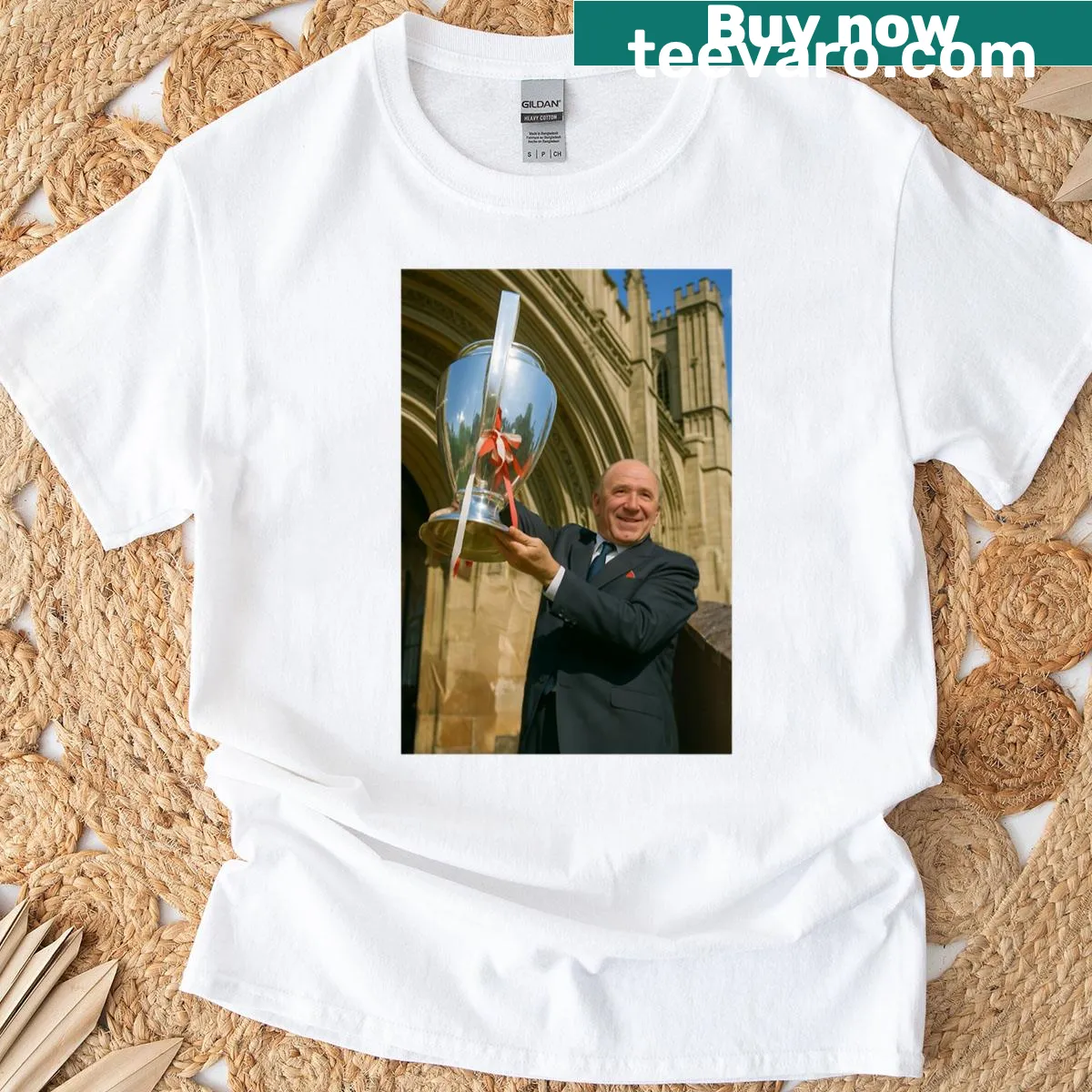 T-shirt featuring a triumphant figure and trophy in a sports design — on a men's t-shirt