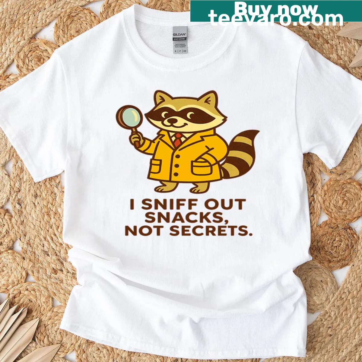 Illustrated raccoon graphic with text about sniffing snacks on t-shirt — on a men's t-shirt