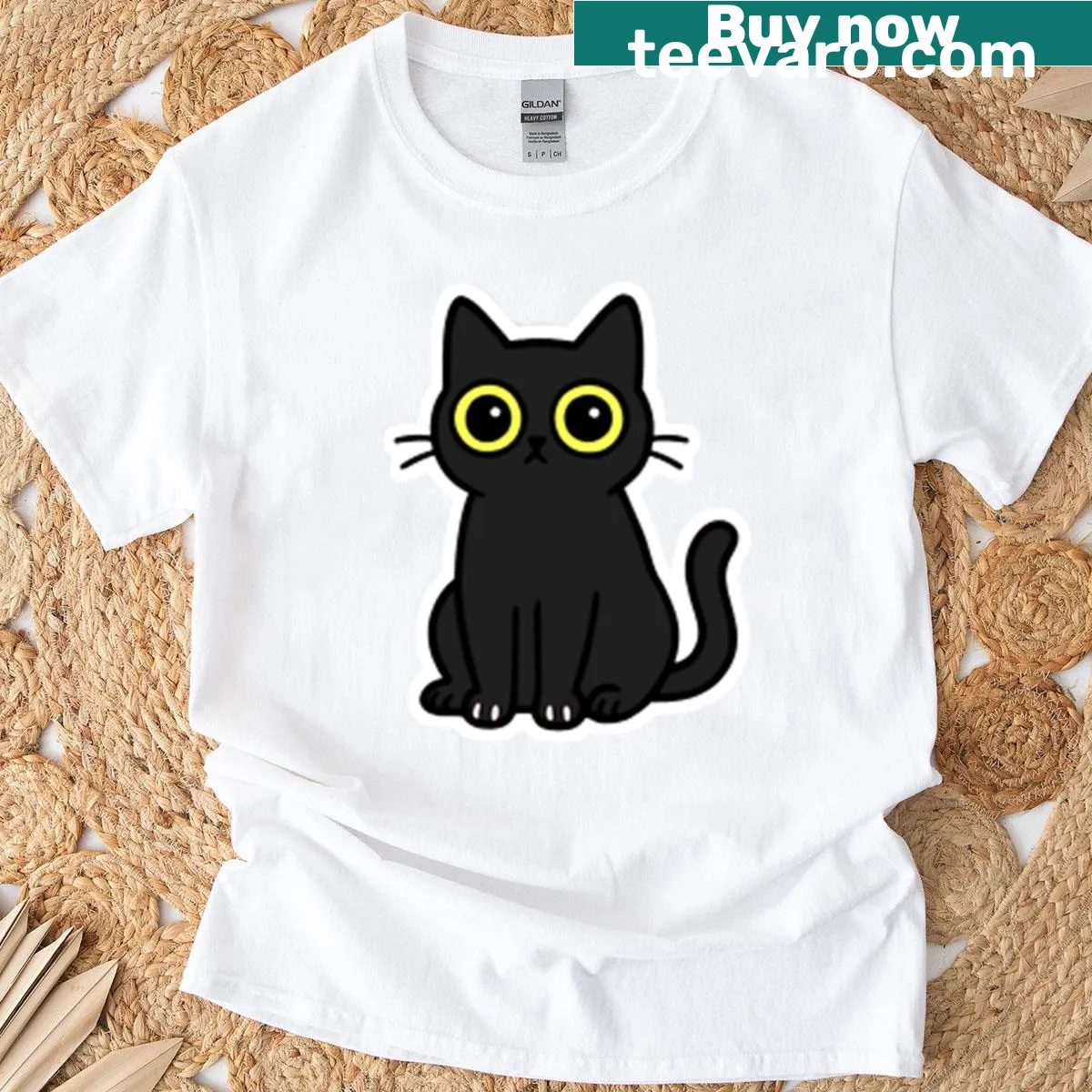 Black cat sticker t-shirt with big eyes and a surprised expression — on a men's t-shirt
