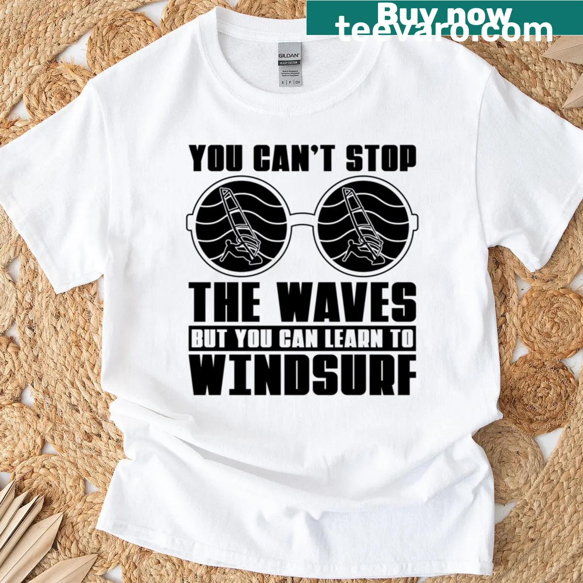 Illustration of a windsurfer with text 'You Can't Stop The Water' — on a men's t-shirt