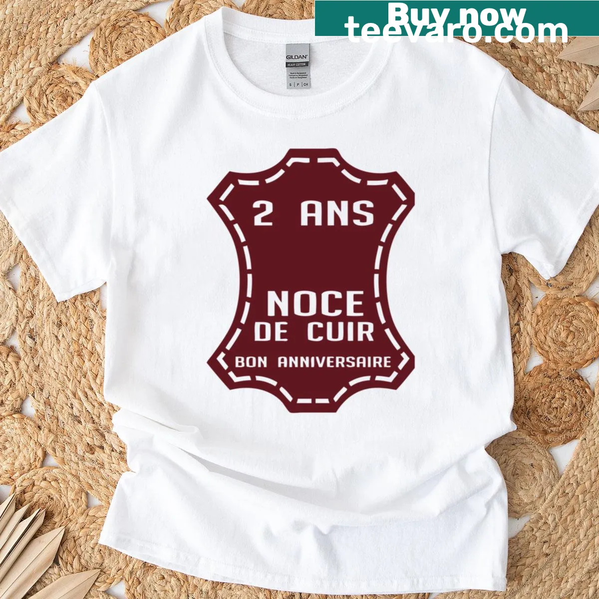 Anniversary T-shirt with leather-themed graphic design — on a men's t-shirt