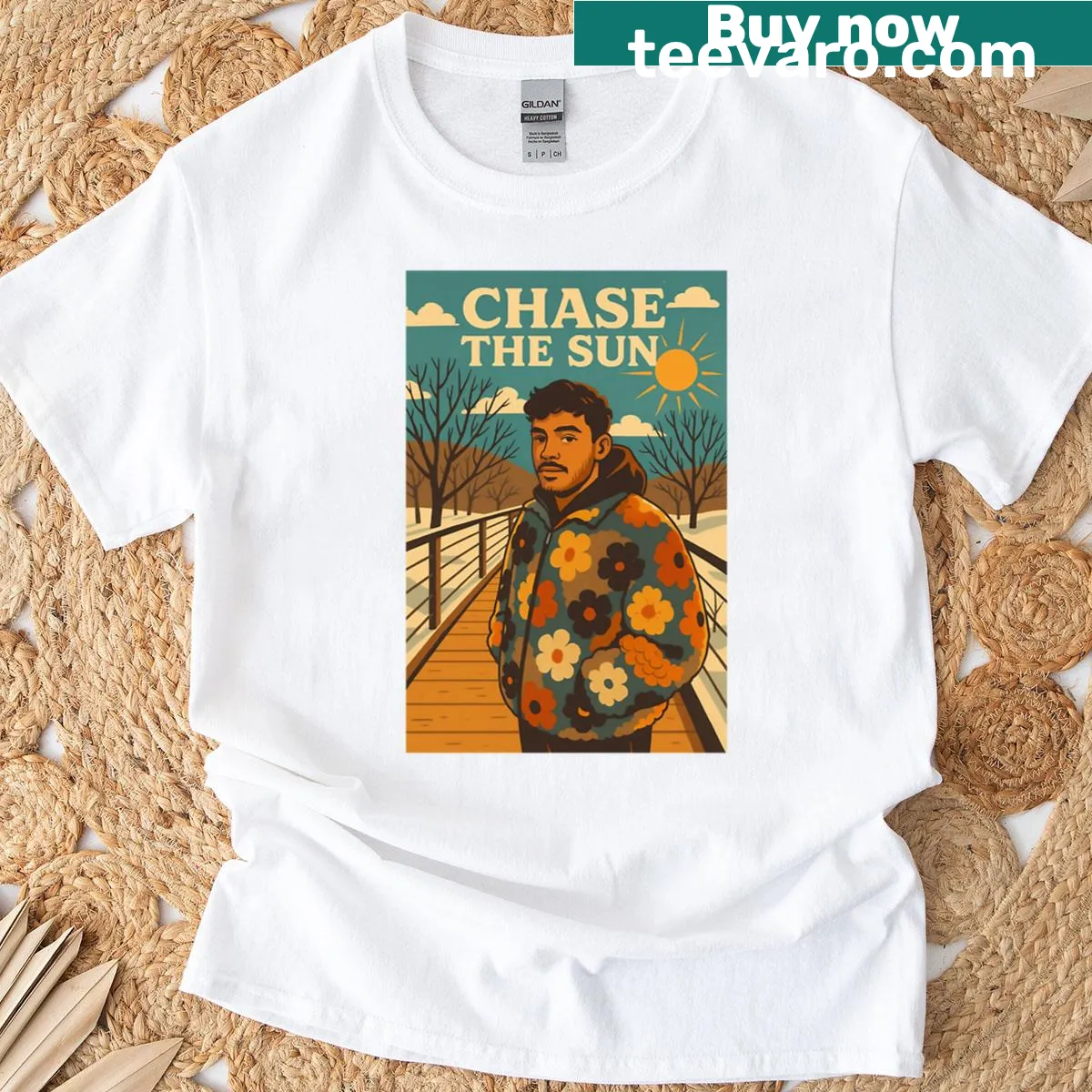 Vintage-style t-shirt with an adventure poster and floral jacket graphic — on a men's t-shirt