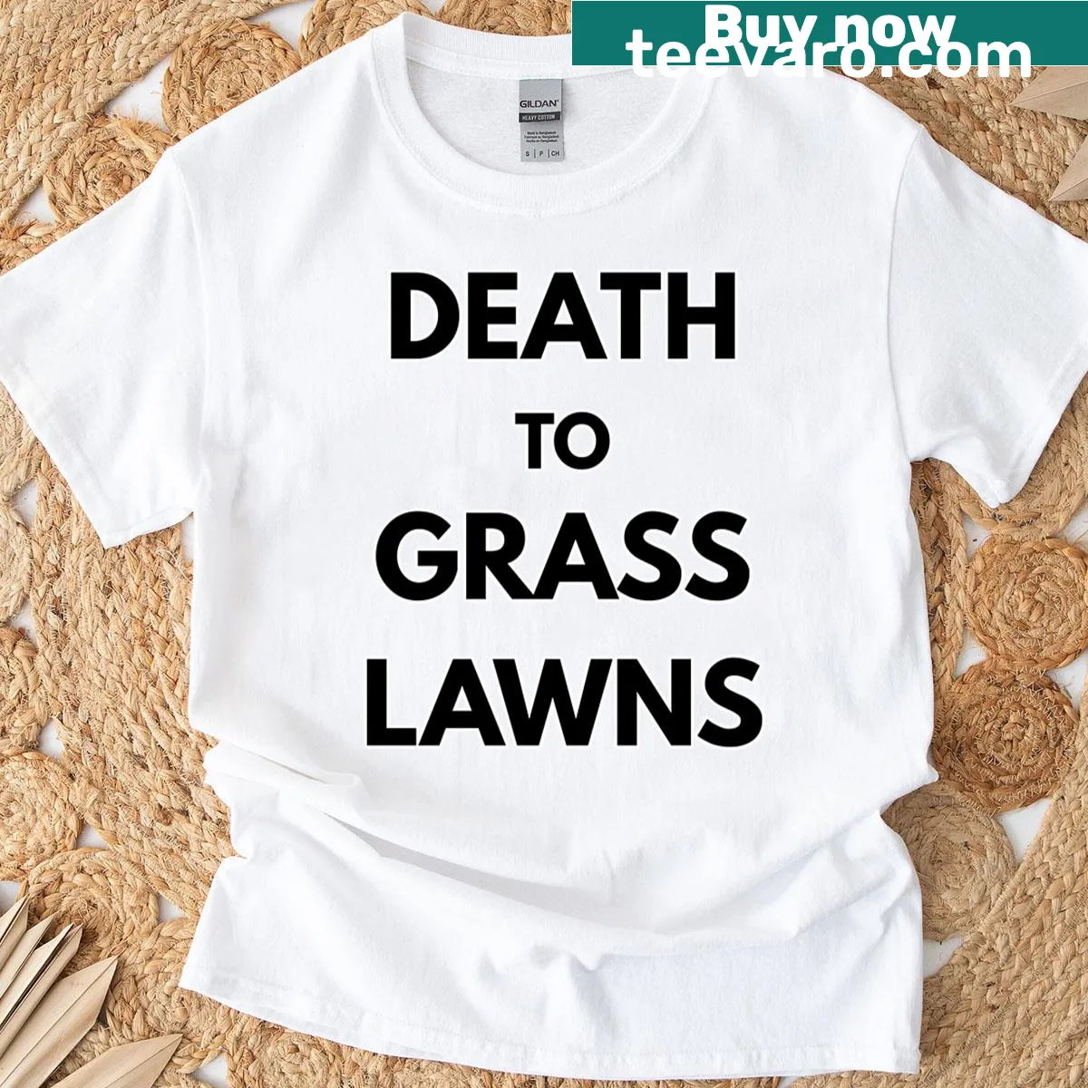 Oversized T-shirt with 'Death To Grass Lawns' statement in bold typography. — on a men's t-shirt