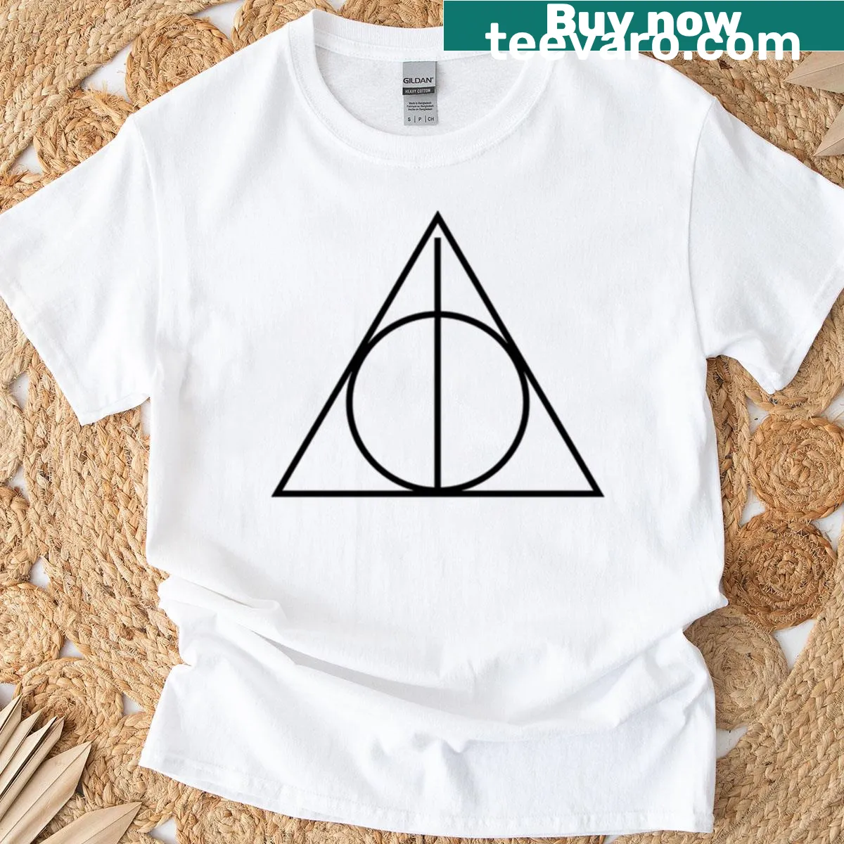 Minimalist T-shirt featuring the Deathly Hallows symbol in silhouette — on a men's t-shirt