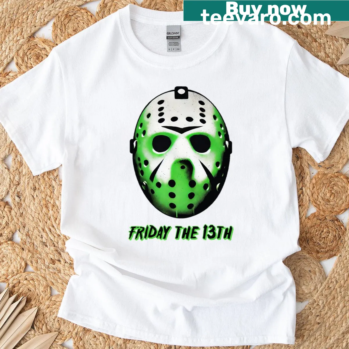 Jason mask glow-in-the-dark design on horror-themed t-shirt — on a men's t-shirt