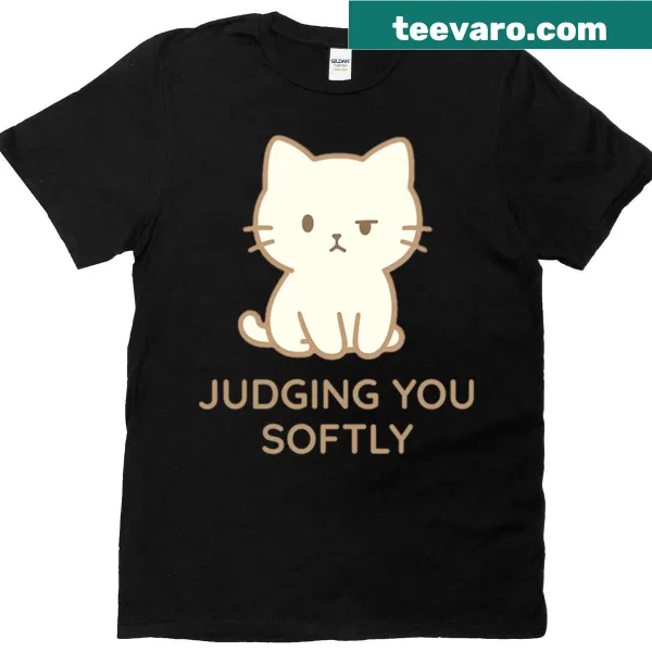 Kawaii cat graphic with the text 'Judging You Softly' on a T-shirt.