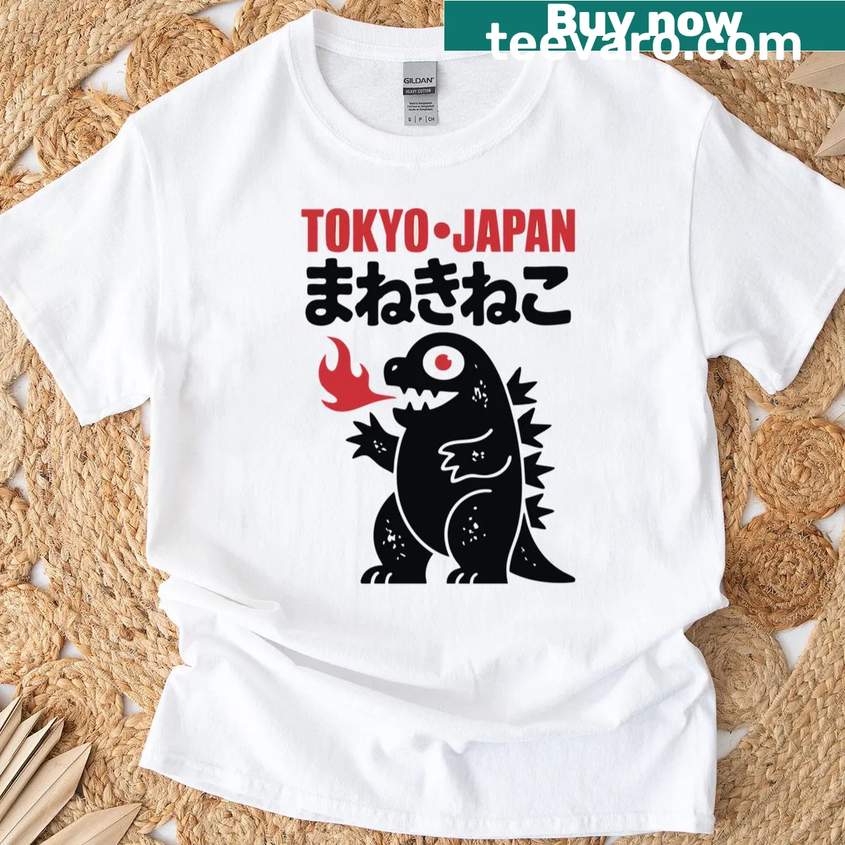 Cartoon Godzilla T-shirt illustration with a playful design — on a men's t-shirt