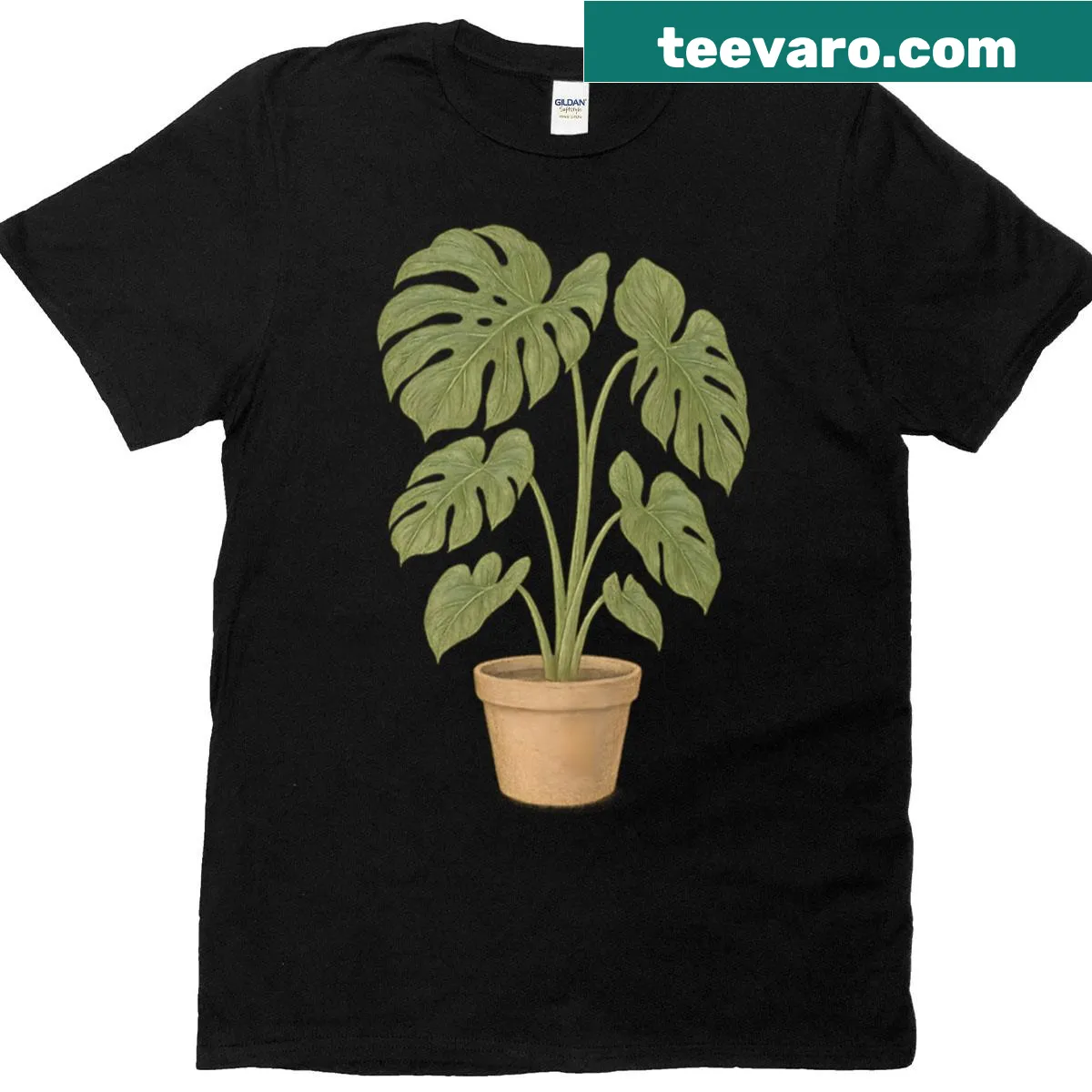 Vintage botanical t-shirt featuring Monstera Deliciosa leaves — on a men's t-shirt