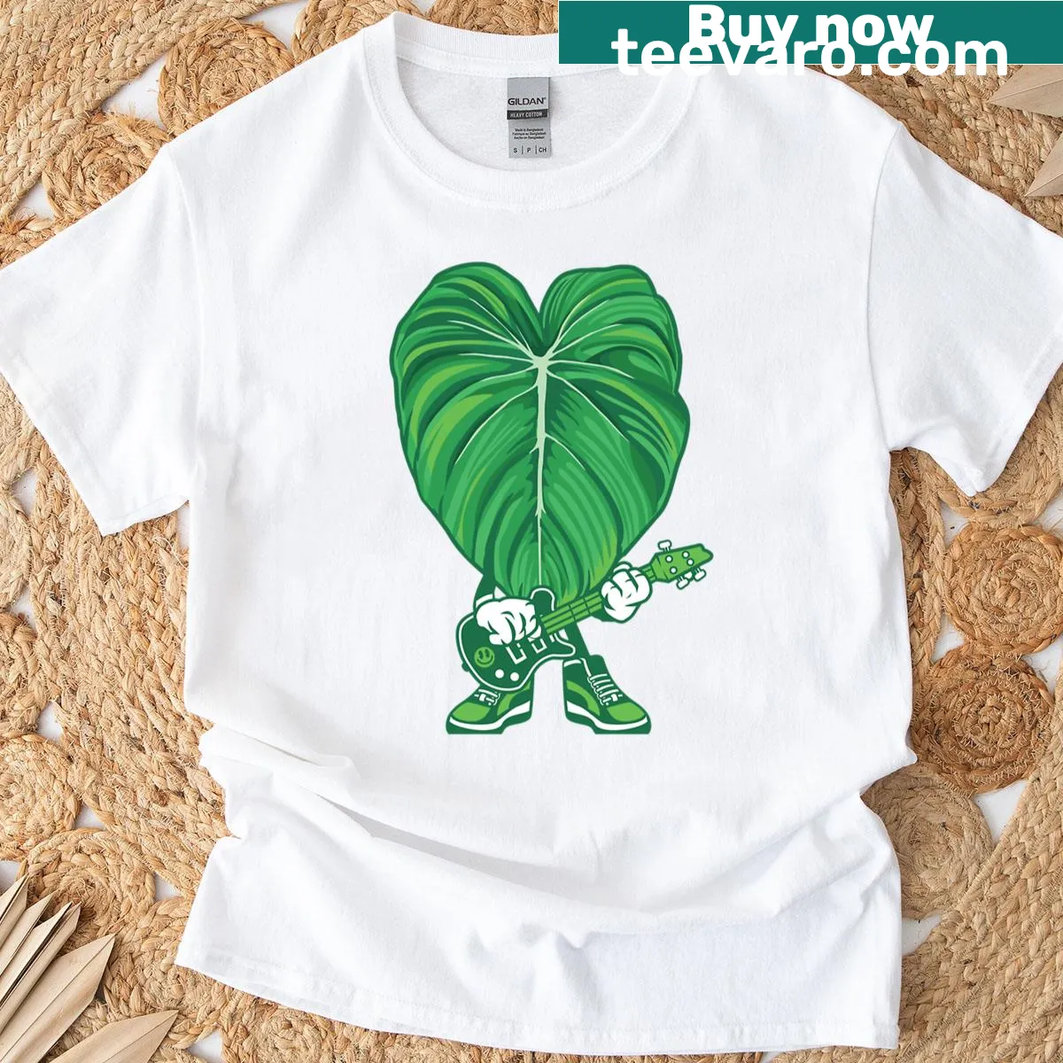 Cartoon Philodendron Pastazanum with a guitar on a T-shirt — on a men's t-shirt