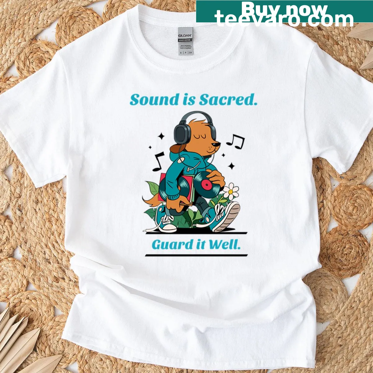Oversized Sound Is Sacred graphic tee with bold lettering — on a men's t-shirt