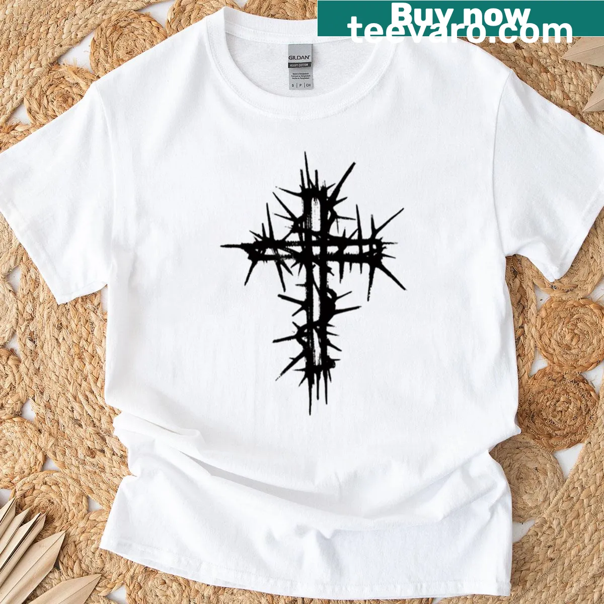 Silhouette of a thorned cross on a minimalist oversized t-shirt — on a men's t-shirt