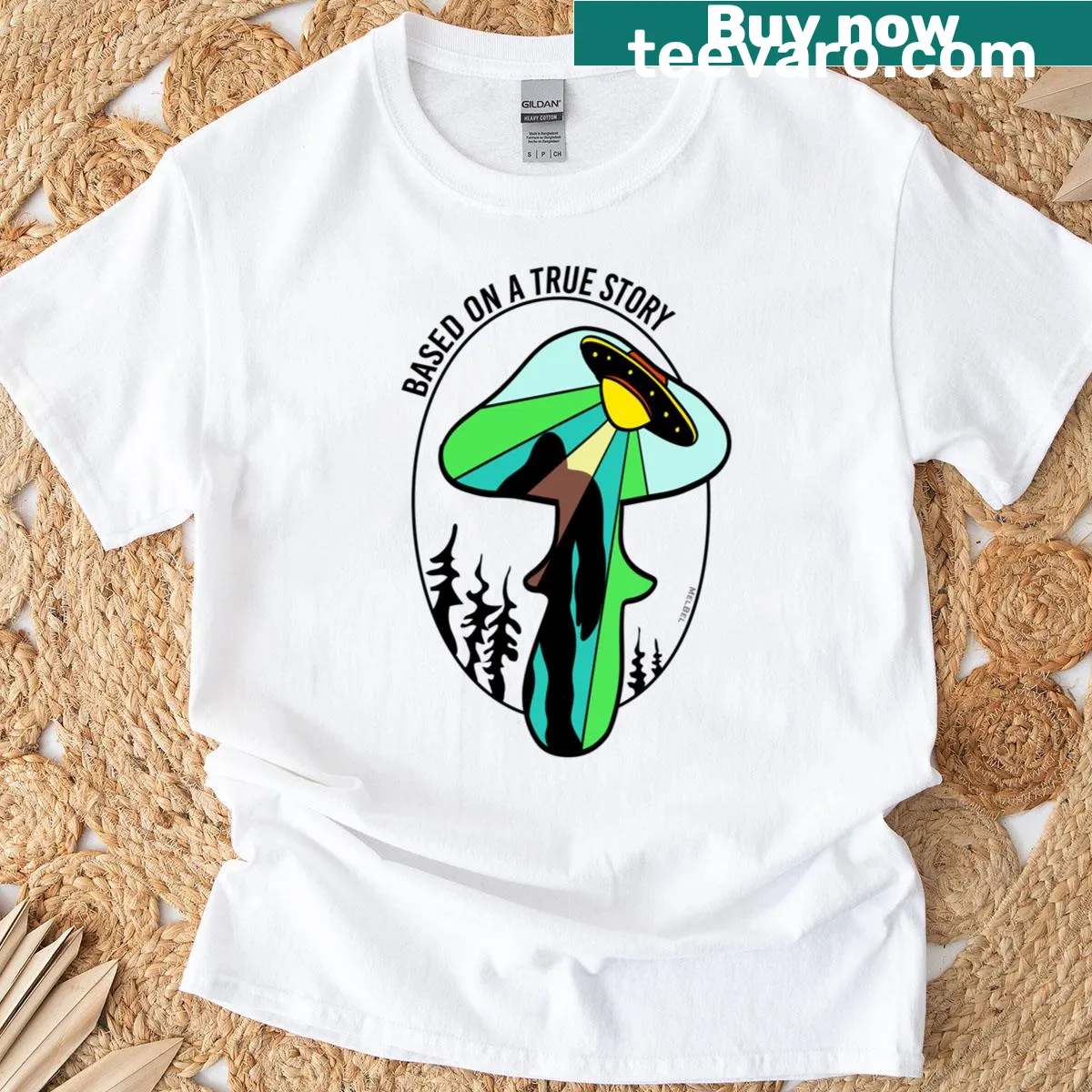 Illustration of Bigfoot under UFO on T-shirt — on a men's t-shirt