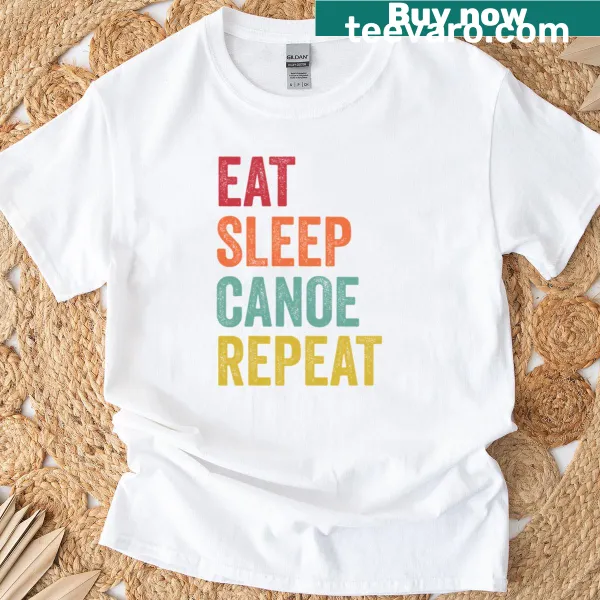 Phrase 'Eat Sleep Canoe Repeat' on T-shirt