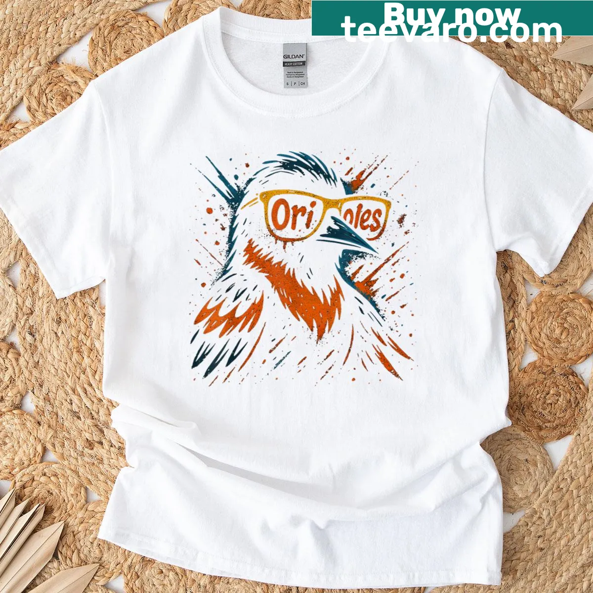 Illustrative T-shirt featuring an oriole and name design — on a men's t-shirt