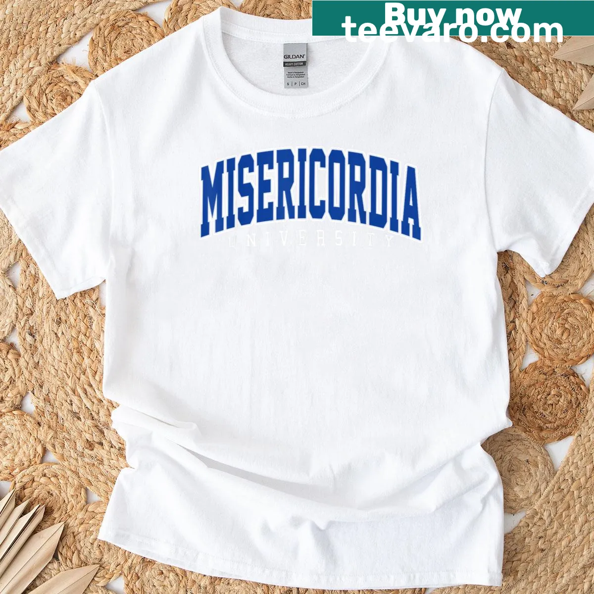 Vintage Misericordia college tee with an athletic arch design. — on a men's t-shirt