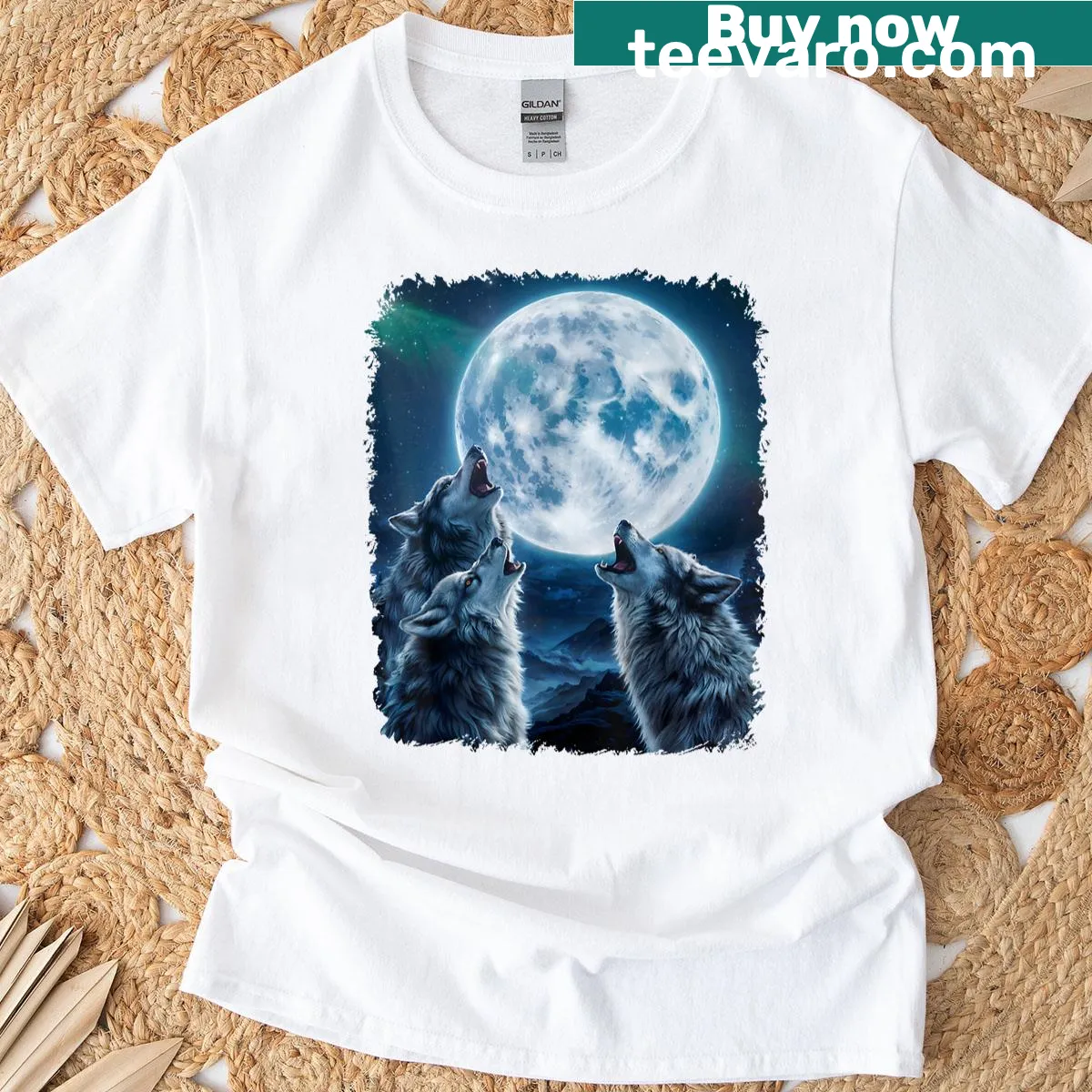 Vintage graphic of wolves howling at a full moon on T-shirt — on a men's t-shirt