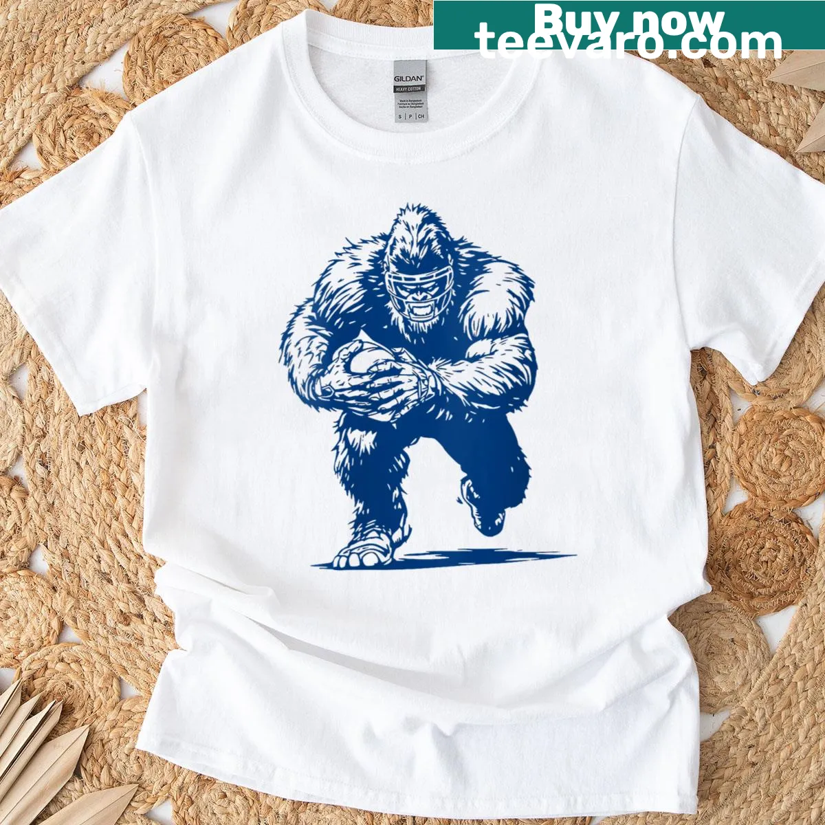 Illustration of Bigfoot playing football on a humorous t-shirt — on a men's t-shirt