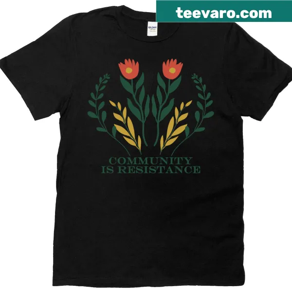 Floral T-shirt with the message 'Community Is Resistance' for activism