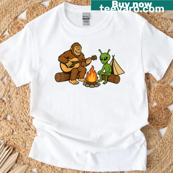 Illustration t-shirt featuring Bigfoot by a campfire with an alien theme
