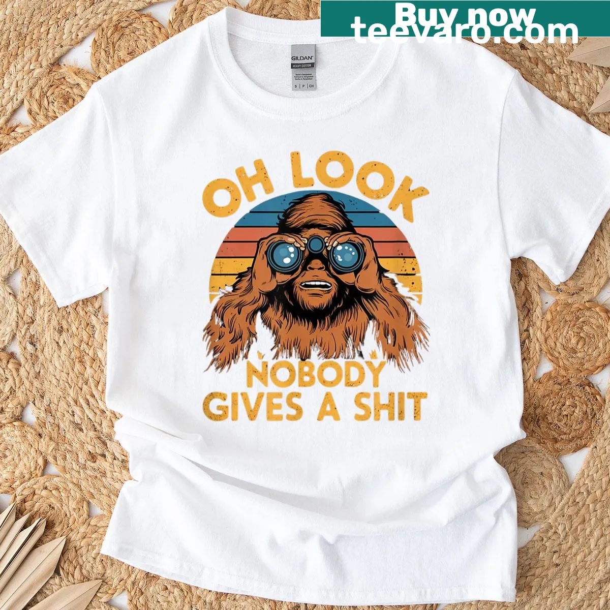 Bold typography t-shirt with the phrase 'Oh Look Nobody Gives A Shit' — on a men's t-shirt