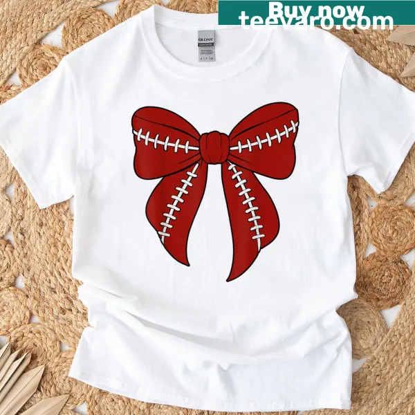 Illustrative T-shirt featuring a feminine bow and football graphic for women.