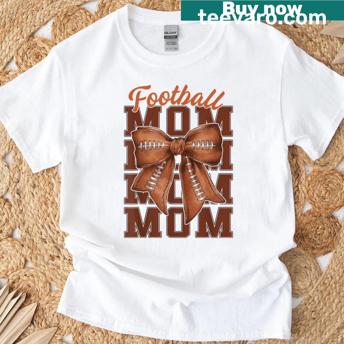 Football Mom t-shirt featuring coquette bow design for sports lovers — on a men's t-shirt