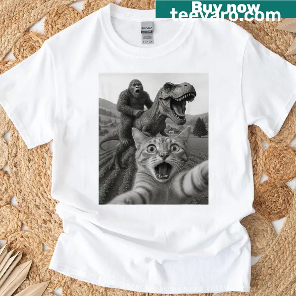 Illustrated cat selfie t-shirt featuring Bigfoot on a T-rex